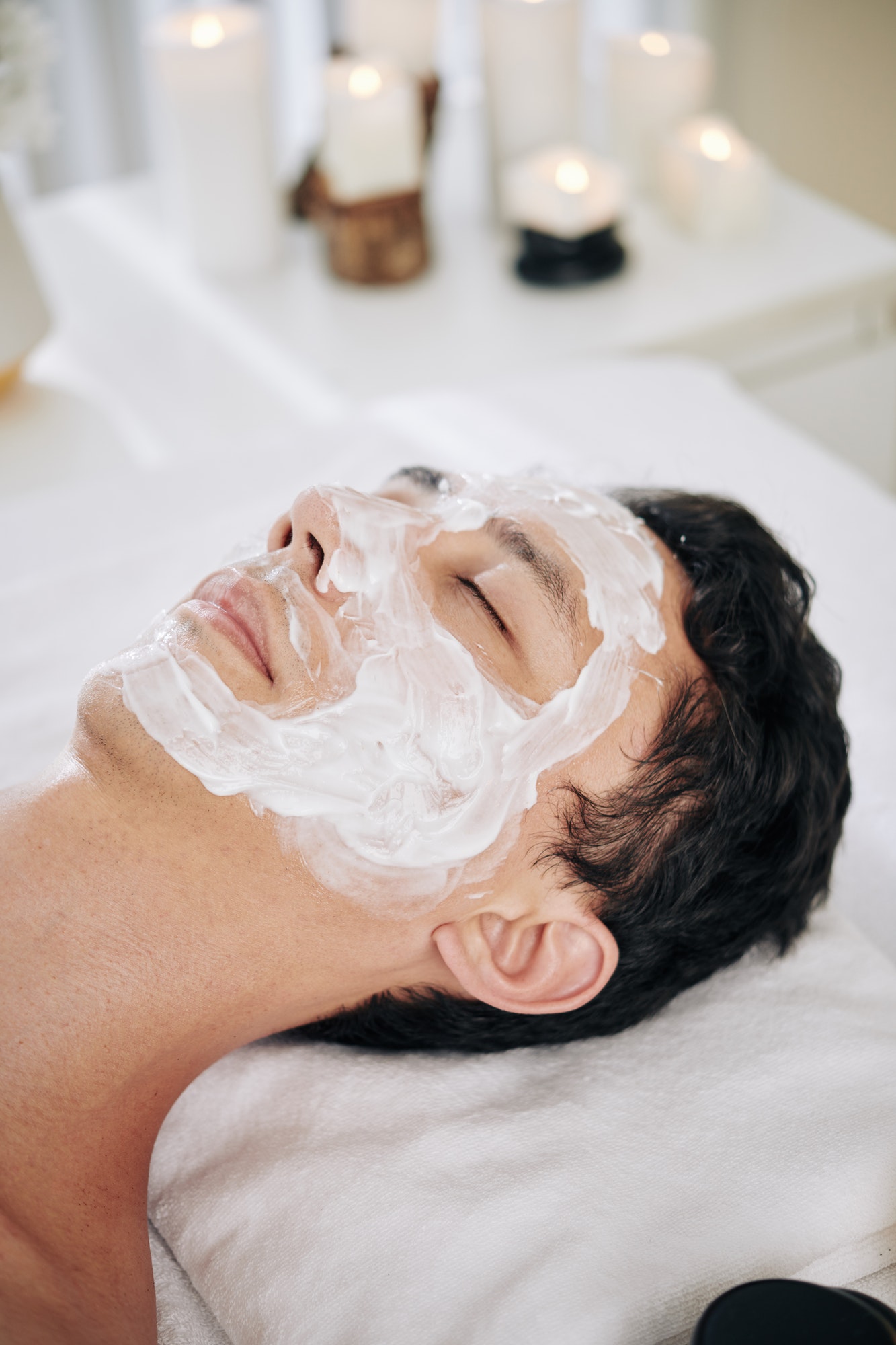 Man with soothing face mask